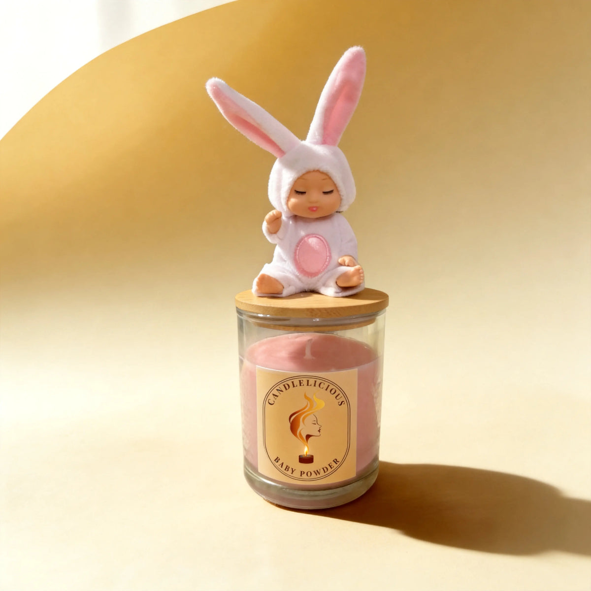 Baby Powder candle with a baby in a bunny suit on the lid