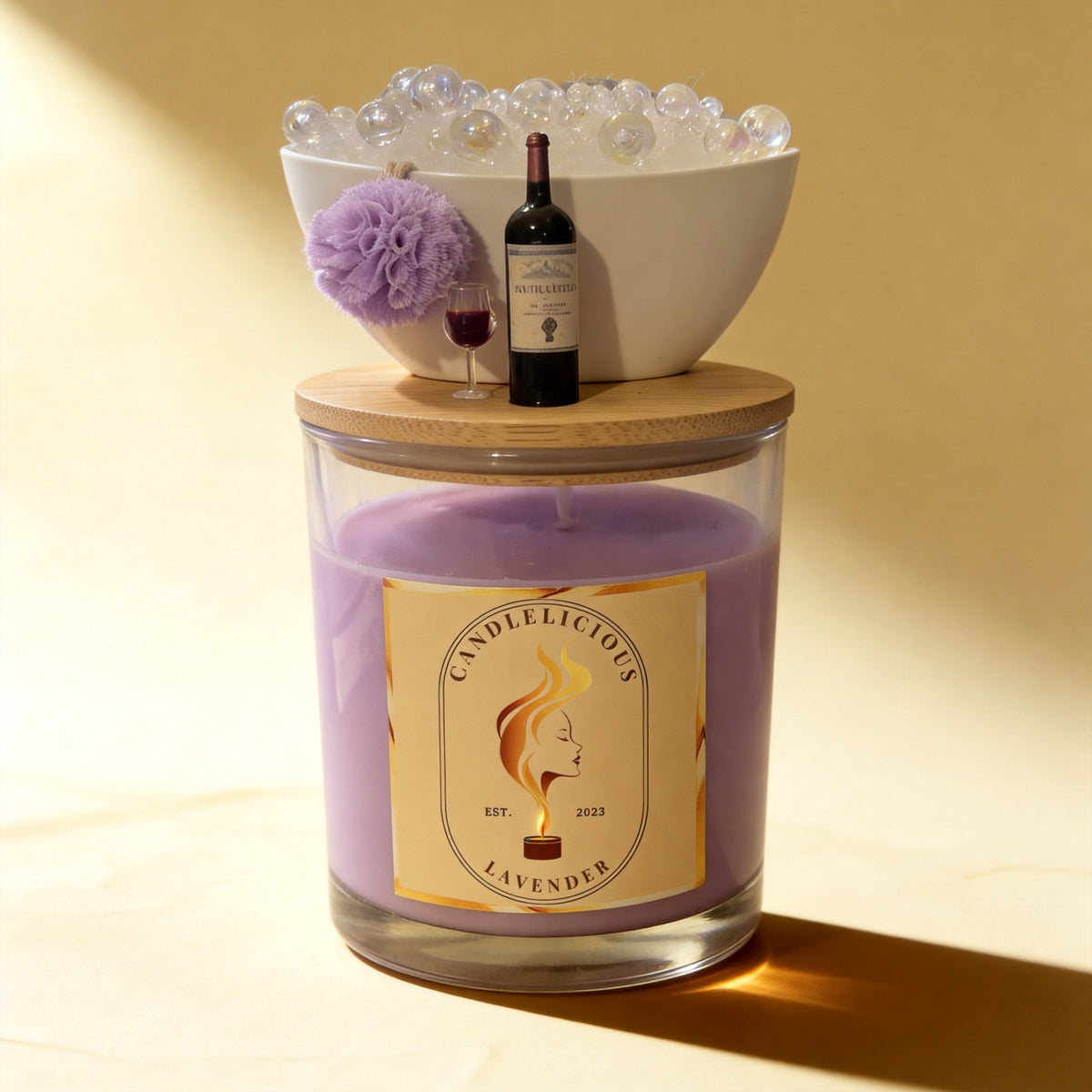 Lavender candle with a bubble bath and a bottle of red wine on the lid