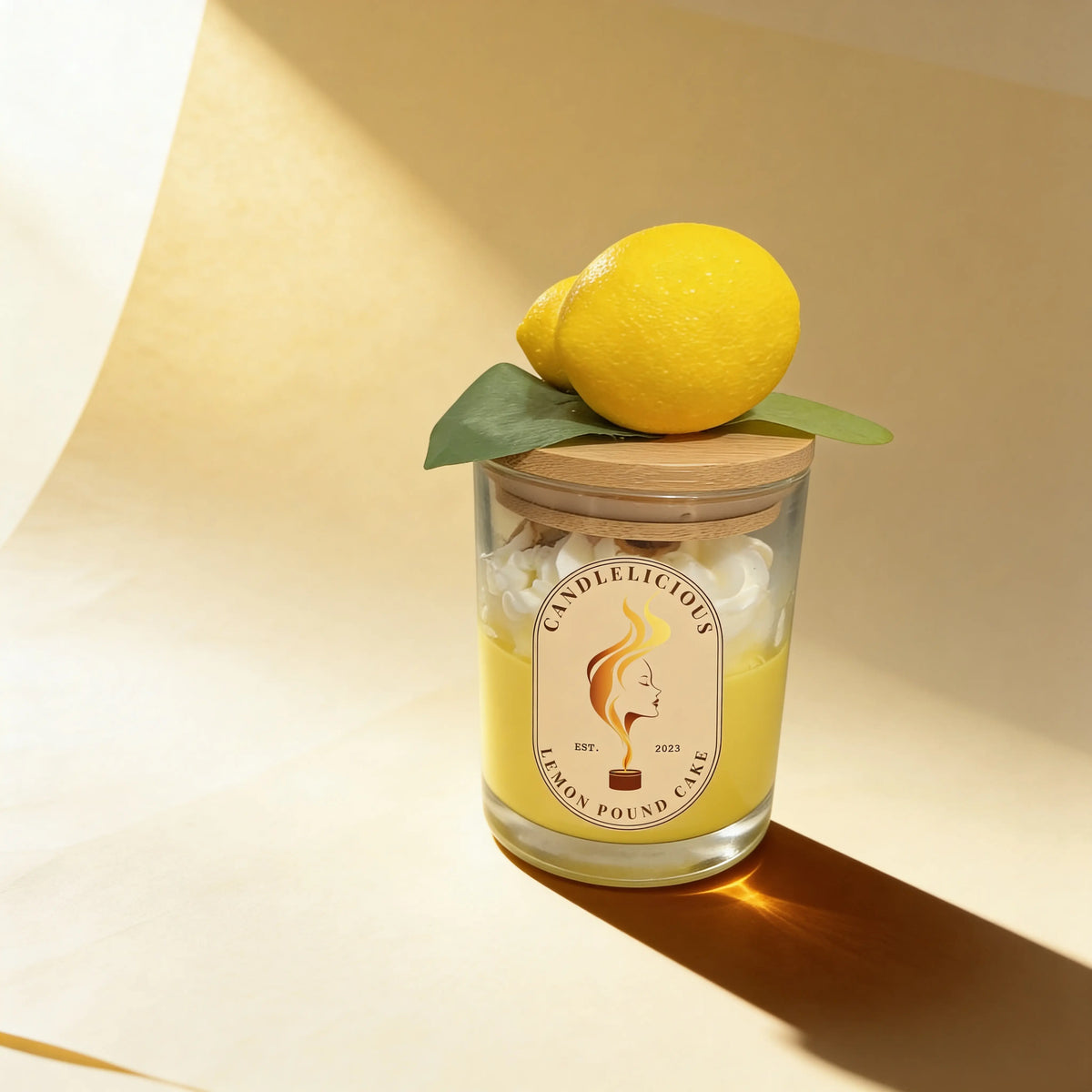 Lemon Pound Cake candle with a whole lemon on the lid