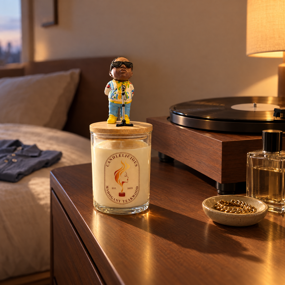 Mahogany Teakwood candle on a bedroom dresser beside a record player