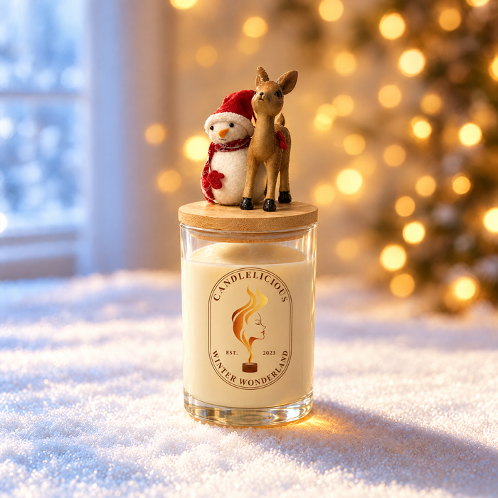 Winter Wonderland candle with a snowman and a fawn on the lid, standing in snow