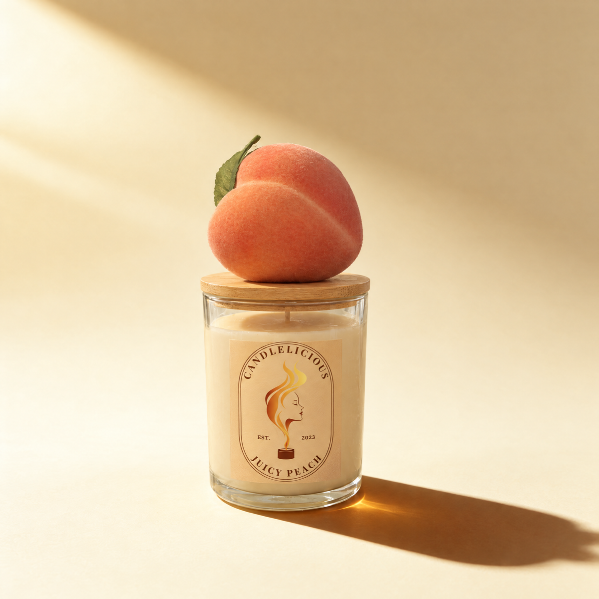 Juicy Peach candle with a peach on the lid