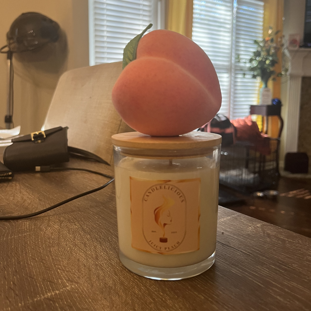 Juicy Peach candle with a peach on the lid